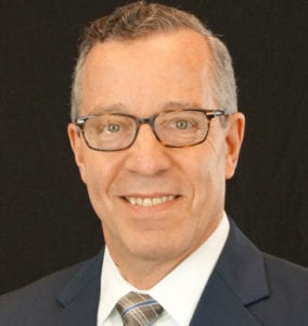 Ron Baron, President and Chief Executive Officer of Del-One Federal Credit Union